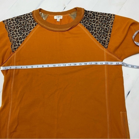 Umgee French Terry, animal print raw edge detail tunic with side slits medium - Picture 12 of 14